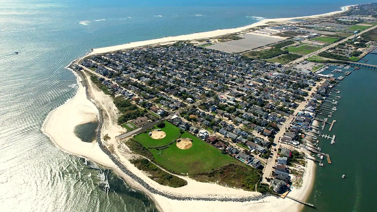 Point Lookout, NY from the air: the grid of avenues between the ocean beach and Reynolds Channel, with Jones Inlet at the east end